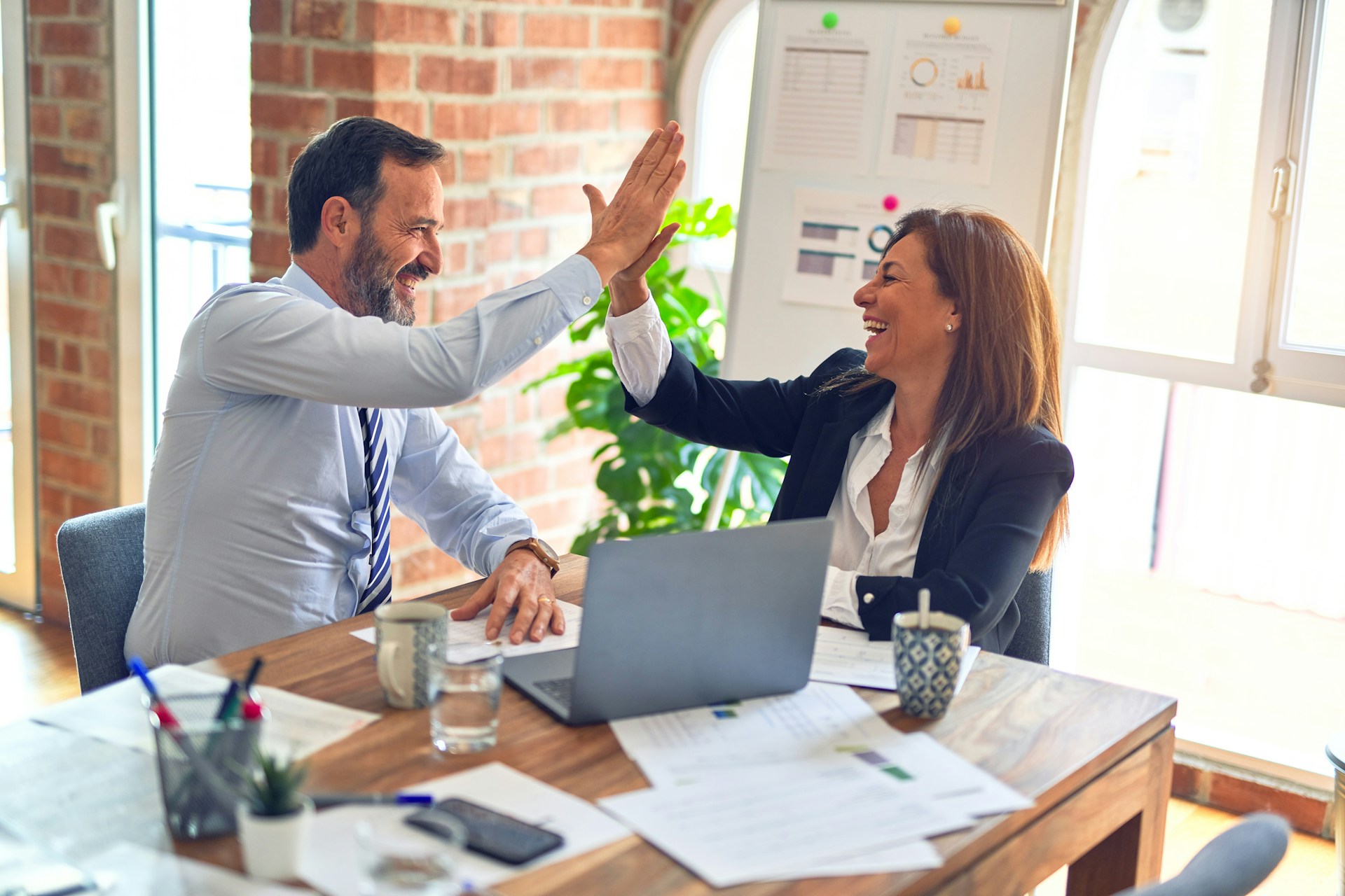 Business team collaborating with Microsoft 365